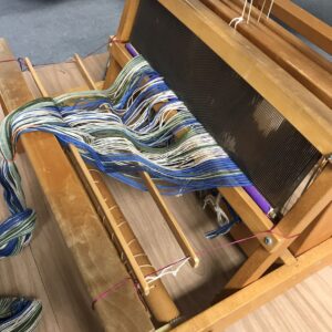 Reed goes into the table loom