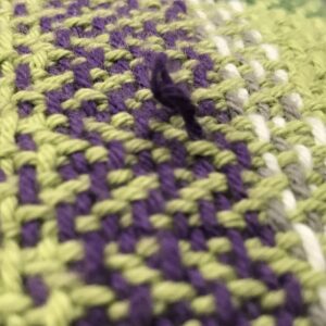 Snagged Purple Yarn